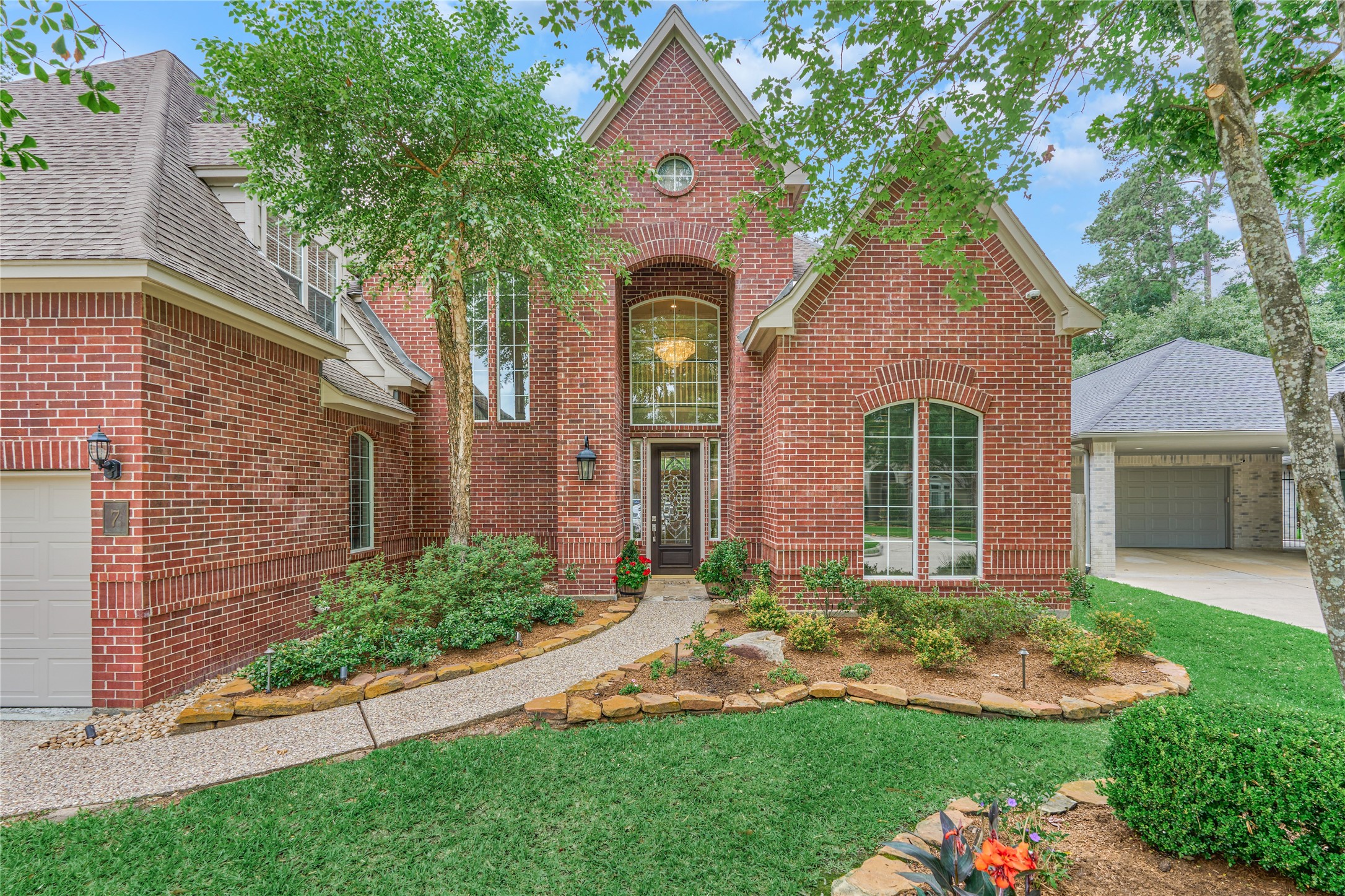 7 Gentry Oak Court Spring, TX 77381 - Photo 4 of 50 front view of a house with a yard