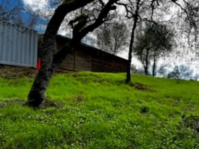 a living room with lots of furniture and a table