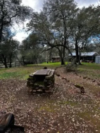 a backyard of a house with lots of green space
