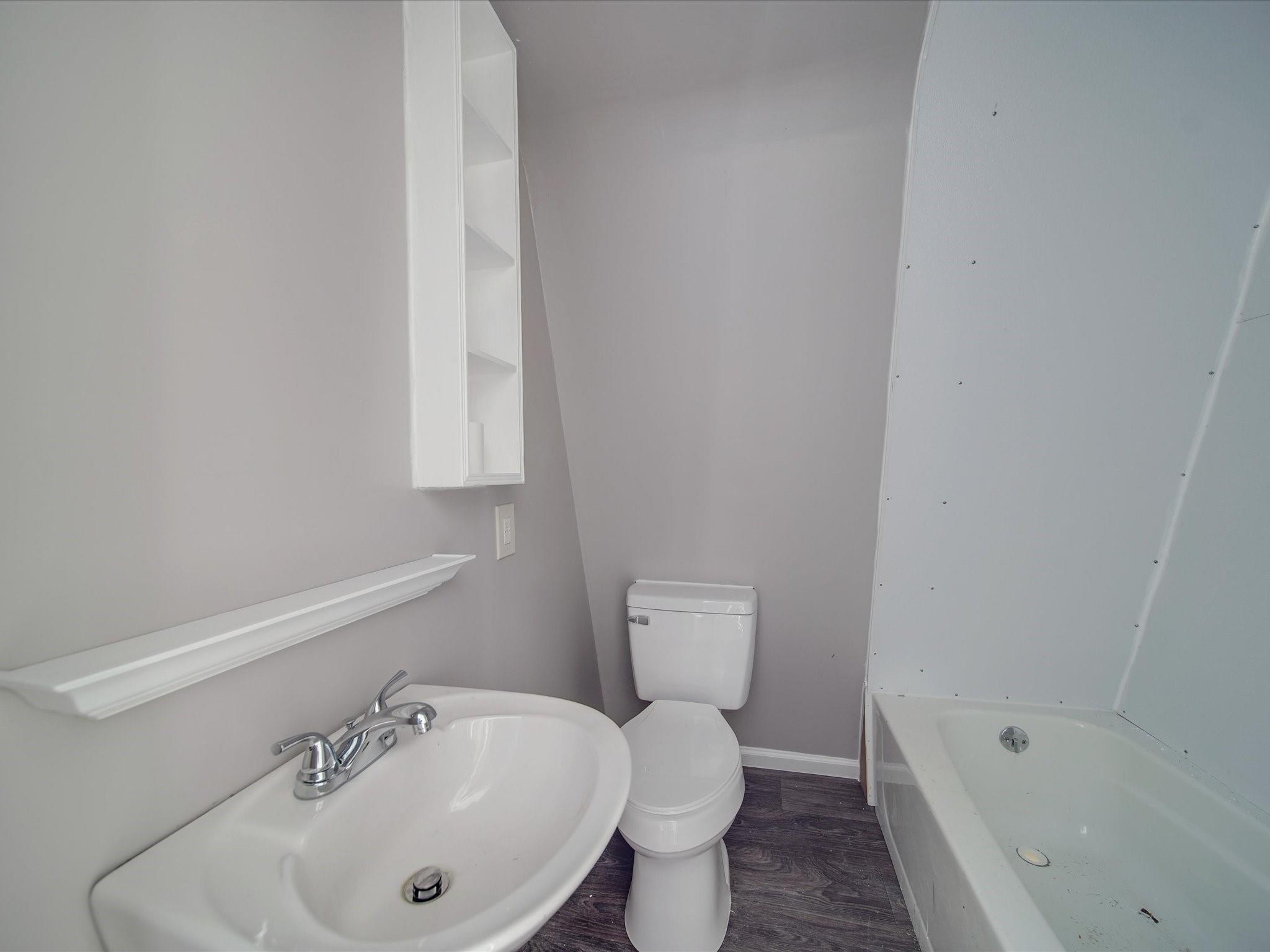 989 Pinckney Road Chester, SC 29706 - Photo 15 of 44 a bathroom with a sink and a bathtub