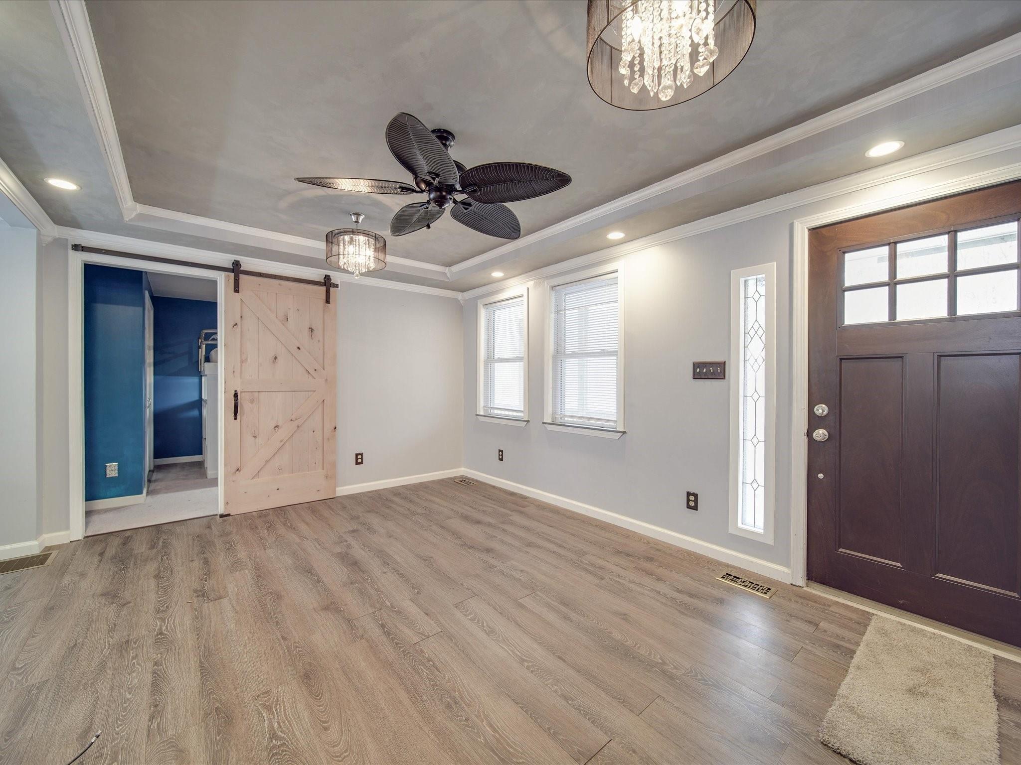 989 Pinckney Road Chester, SC 29706 - Photo 18 of 44 a view of empty room with wooden floor and fan