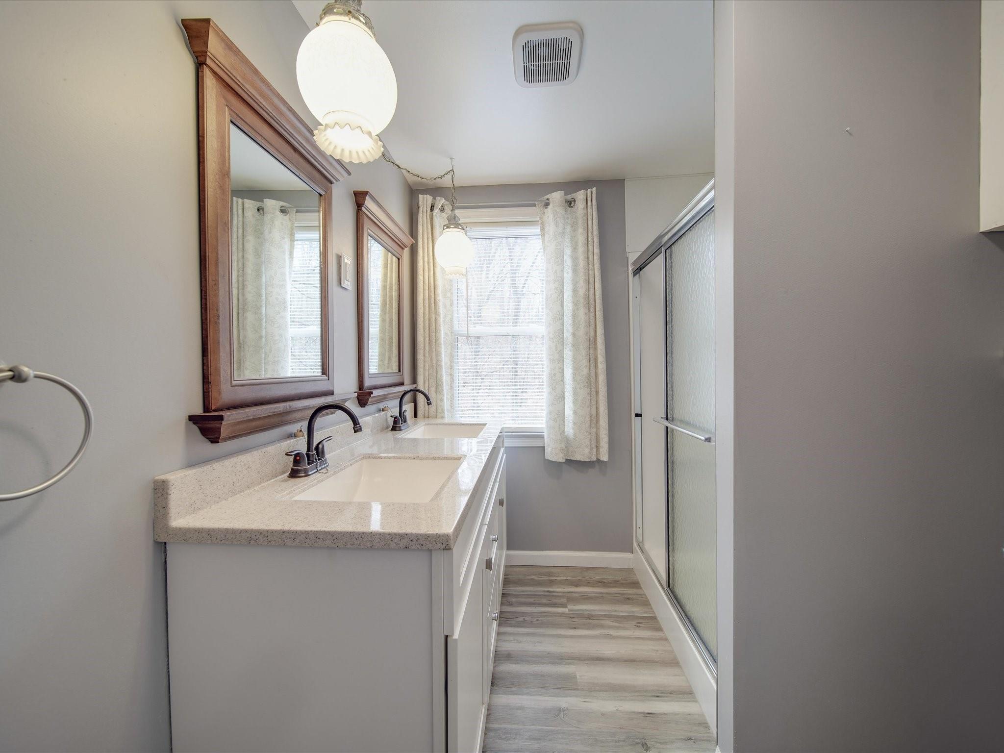 989 Pinckney Road Chester, SC 29706 - Photo 33 of 44 a bathroom with 2 sink and a mirror
