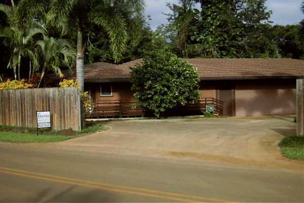 4294 Omao Road Koloa, HI 96756 - Photo 1 of 5 a backyard of a house