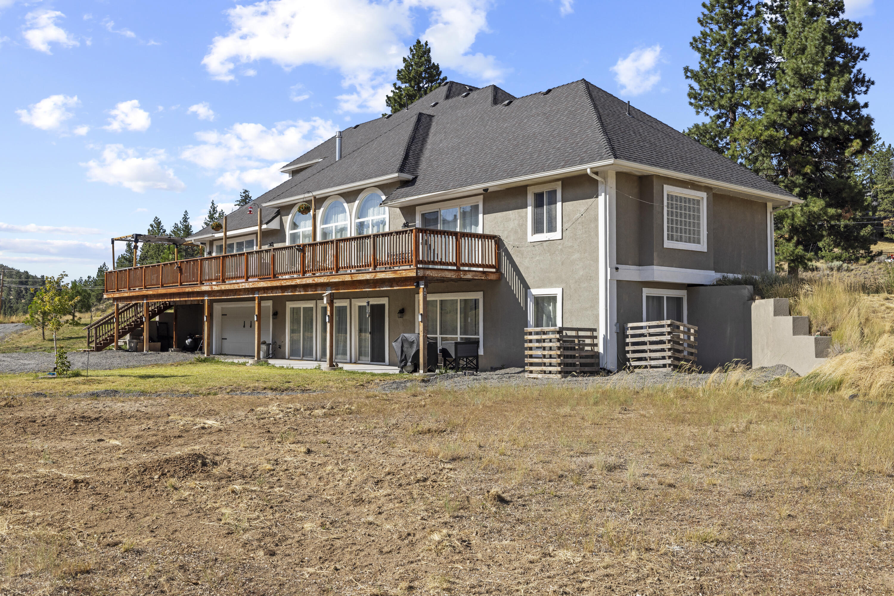3808 Old Fort Road Klamath Falls, OR 97601 - Photo 78 of 120 back of house, lower level slider entrance and separate garage