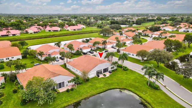 an aerial view of a house with a garden