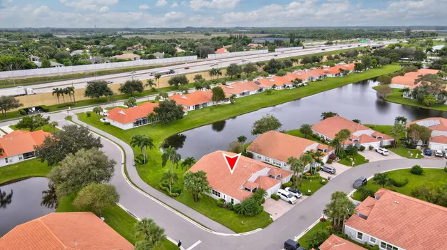 an outdoor space with patio swimming pool and outdoor seating