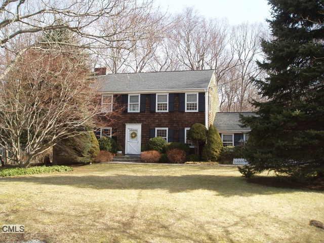 89 Fawnfield Road Stamford, CT 06903 - Photo 1 of 1 a view of a house with snow on the tree