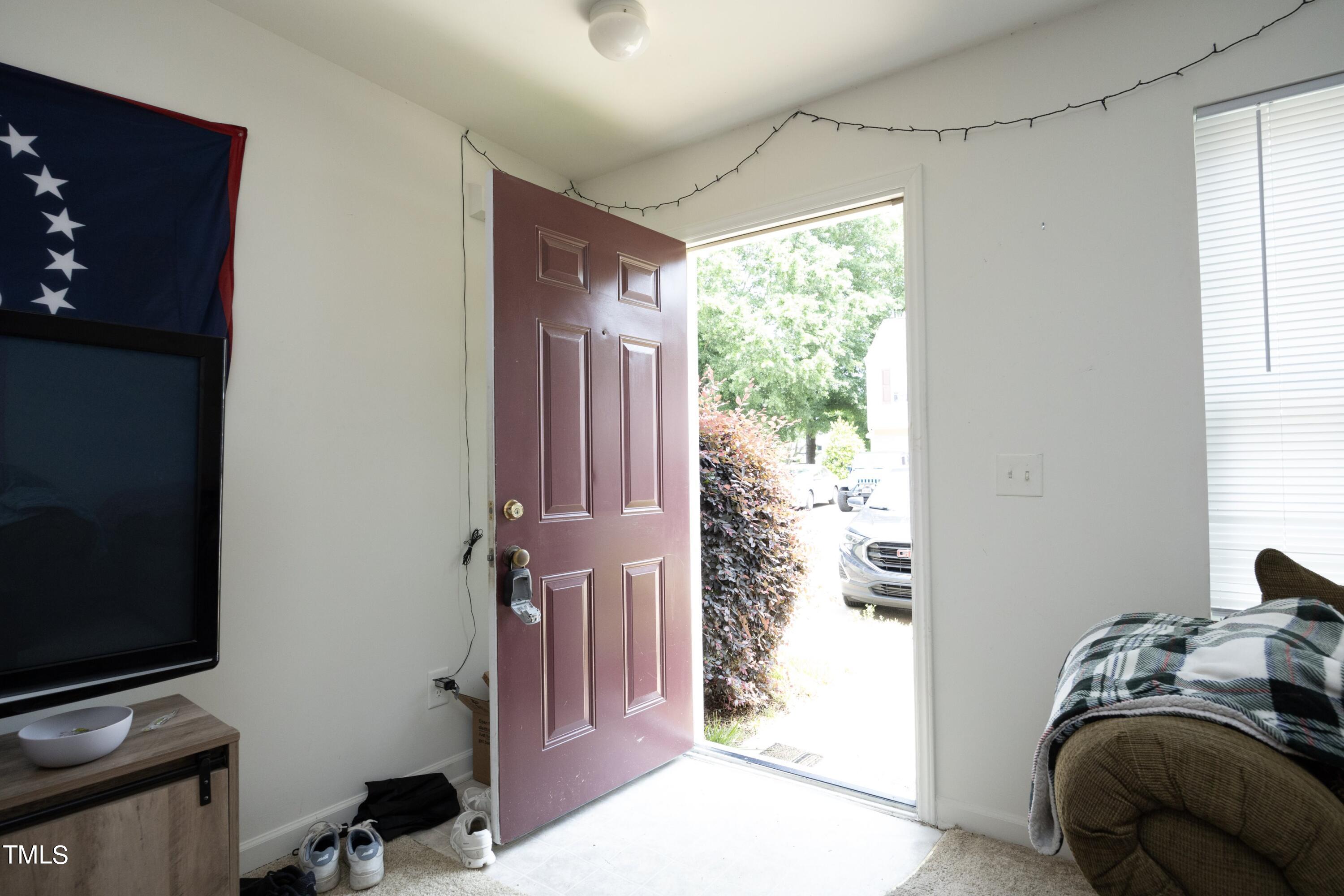 16 Red Lane Raleigh, NC 27606 - Photo 5 of 24 a view of bedroom with a bed and a window