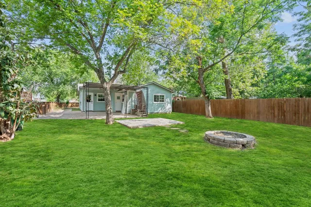 a house view with a garden space