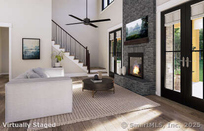 35 Wyllys Farm Road Storrs Mansfield, CT 06268 - Photo 14 of 21 a living room with furniture and a fireplace