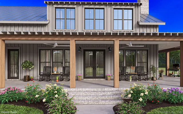 a front view of a house with garden