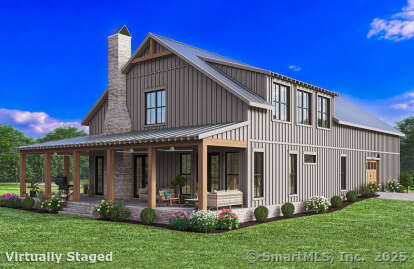 35 Wyllys Farm Road Storrs Mansfield, CT 06268 - Photo 19 of 20 a front view of a house with a yard and porch