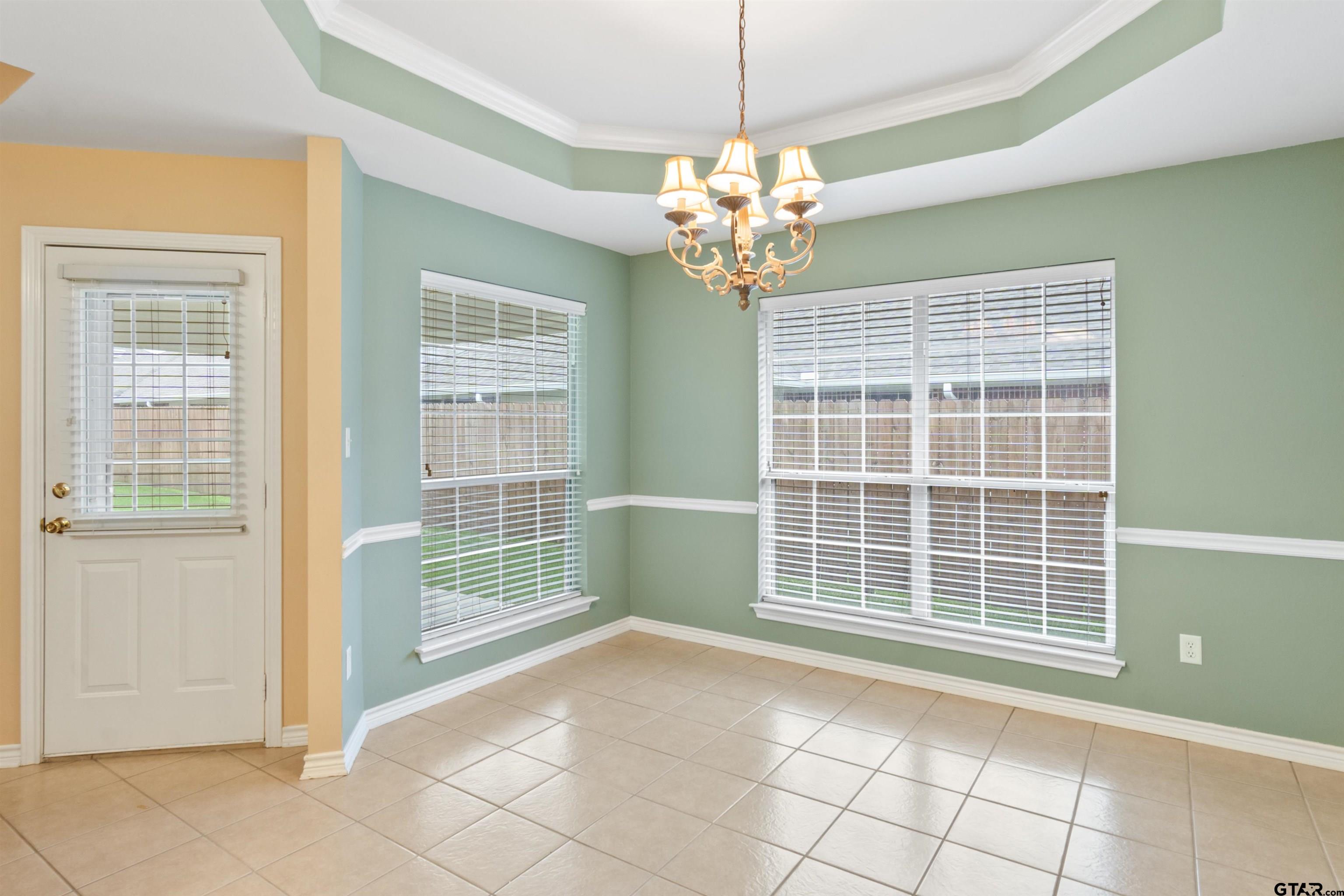 1521 Rice Road, Unit G102 Tyler, TX 75703 - Photo 10 of 23 a view of livingroom with windows