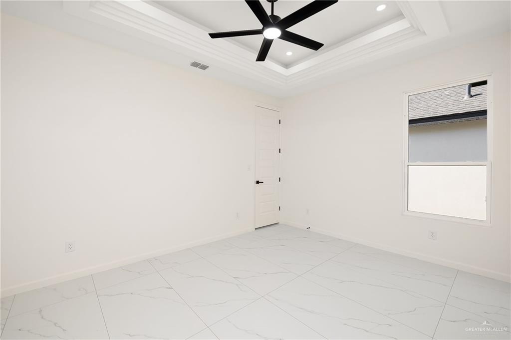901 Azalea Street Mission, TX 78573 - Photo 21 of 29 Bedroom 2, with a ceiling fan, and recessed lighting
