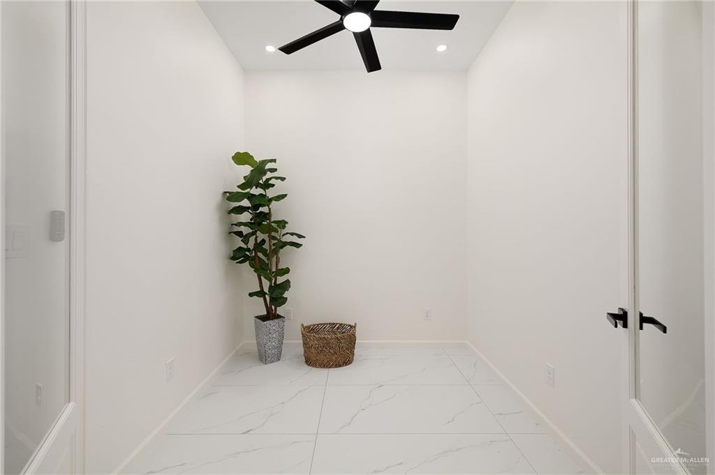 901 Azalea Street Mission, TX 78573 - Photo 5 of 29 Office/Flex room featuring light porcelain finish flooring, a ceiling fan, and recessed lighting