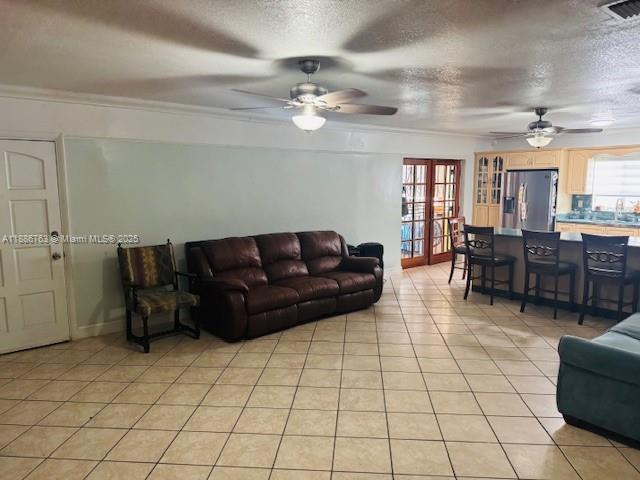 3915 Northwest 4th Terrace Miami, FL 33126 - Photo 33 of 42 a living room with furniture and a chandelier