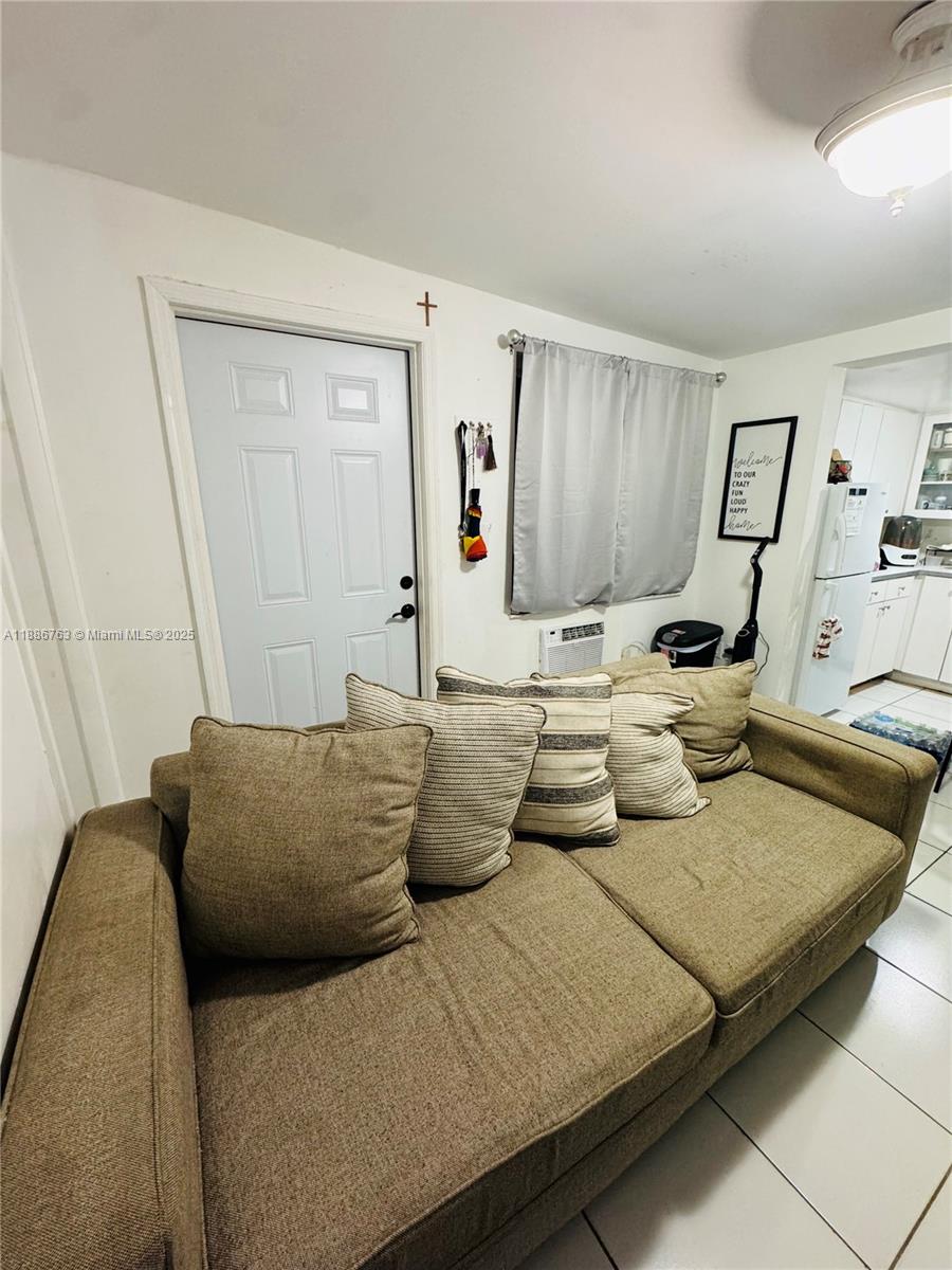 3915 Northwest 4th Terrace Miami, FL 33126 - Photo 35 of 42 a living room with furniture and wooden floor