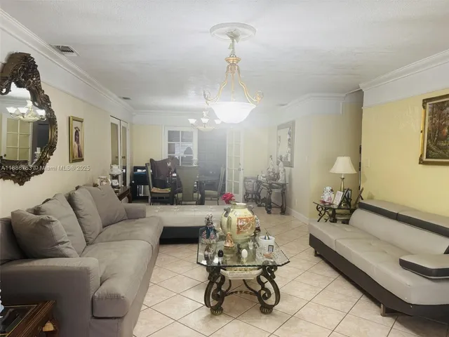 a white toilet sitting next to a bath tub