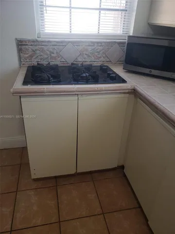 a view of a utility room with washer and dryer
