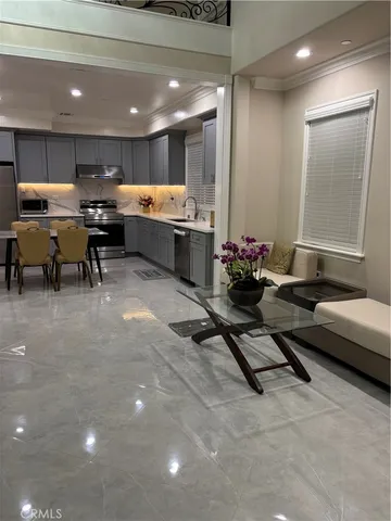 a room with gym equipment and mirrors