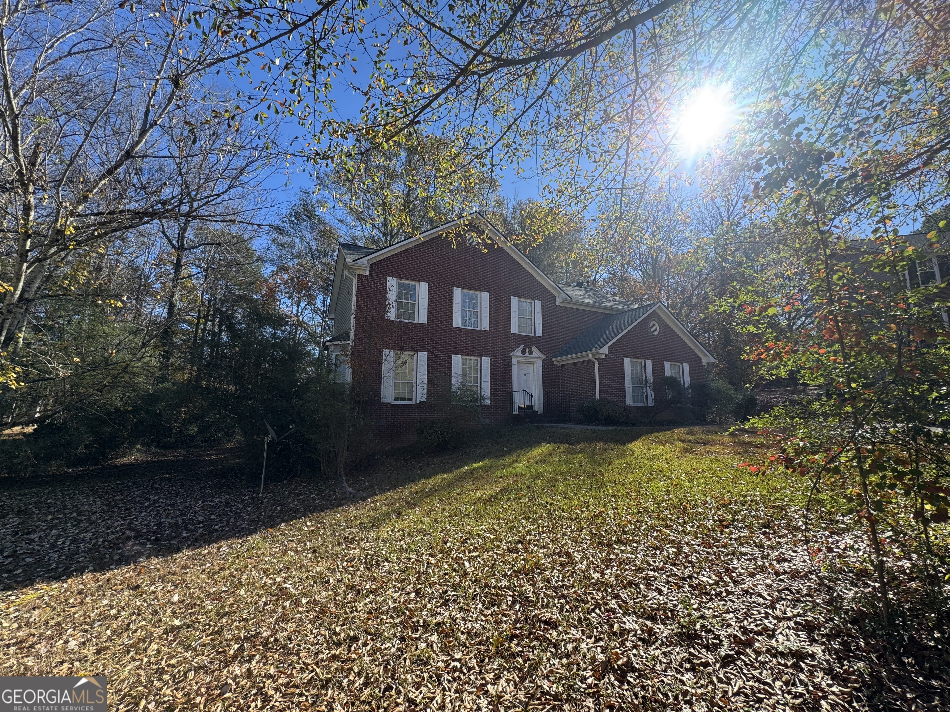 1716 Inlet Cove Court Snellville, GA 30078 - Photo 17 of 17 a front view of a house with a yard