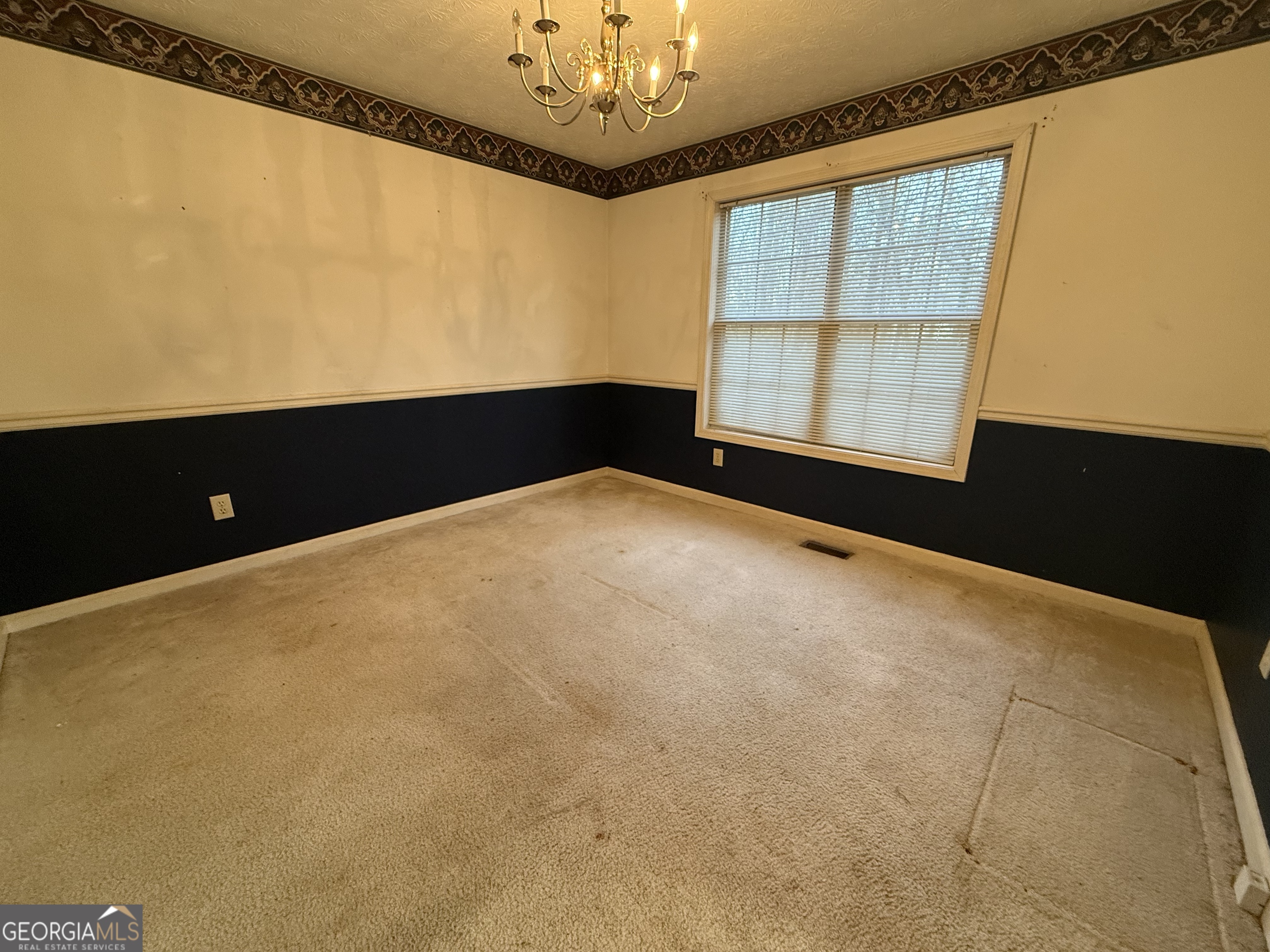 1716 Inlet Cove Court Snellville, GA 30078 - Photo 3 of 17 a view of an empty room with a window