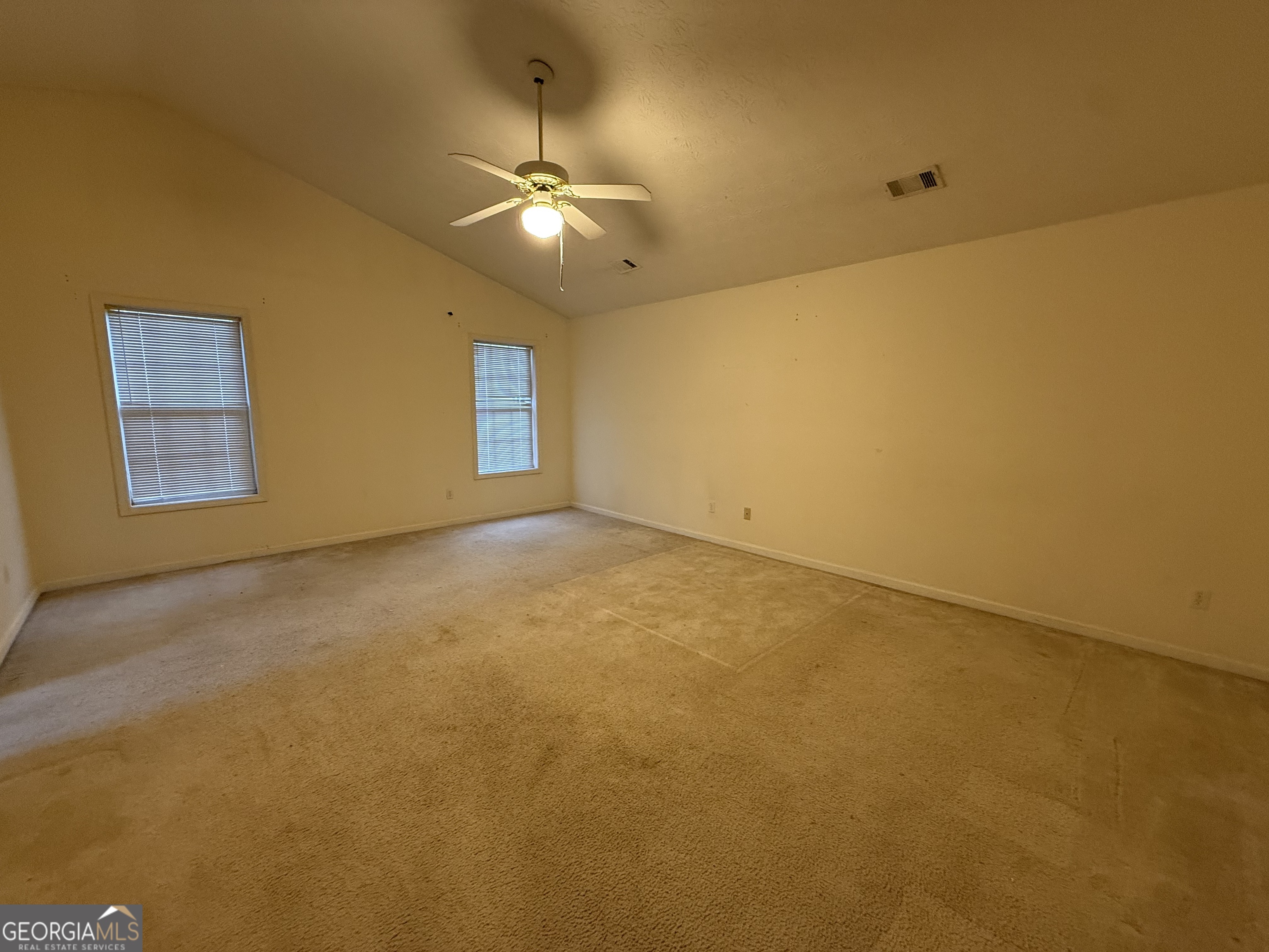 1716 Inlet Cove Court Snellville, GA 30078 - Photo 7 of 17 a view of an empty room