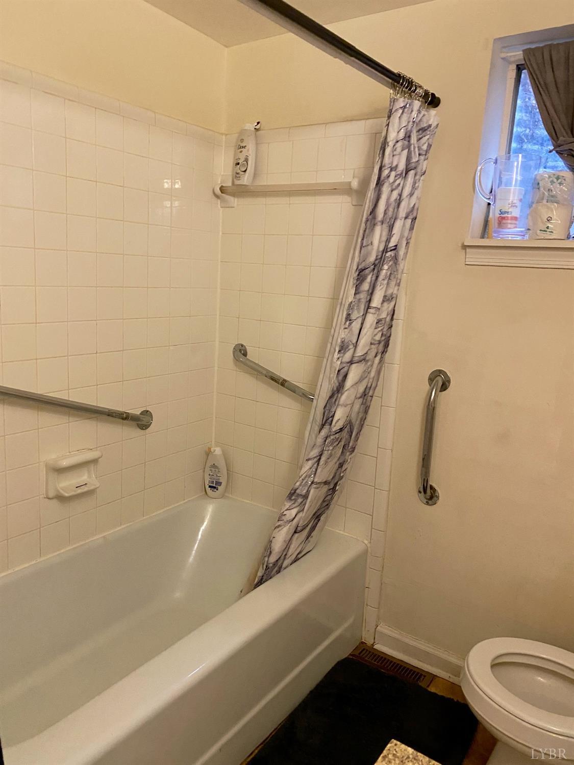 400 Riverside Drive Lynchburg, VA 24503 - Photo 11 of 40 a bathroom with a bathtub and a shower