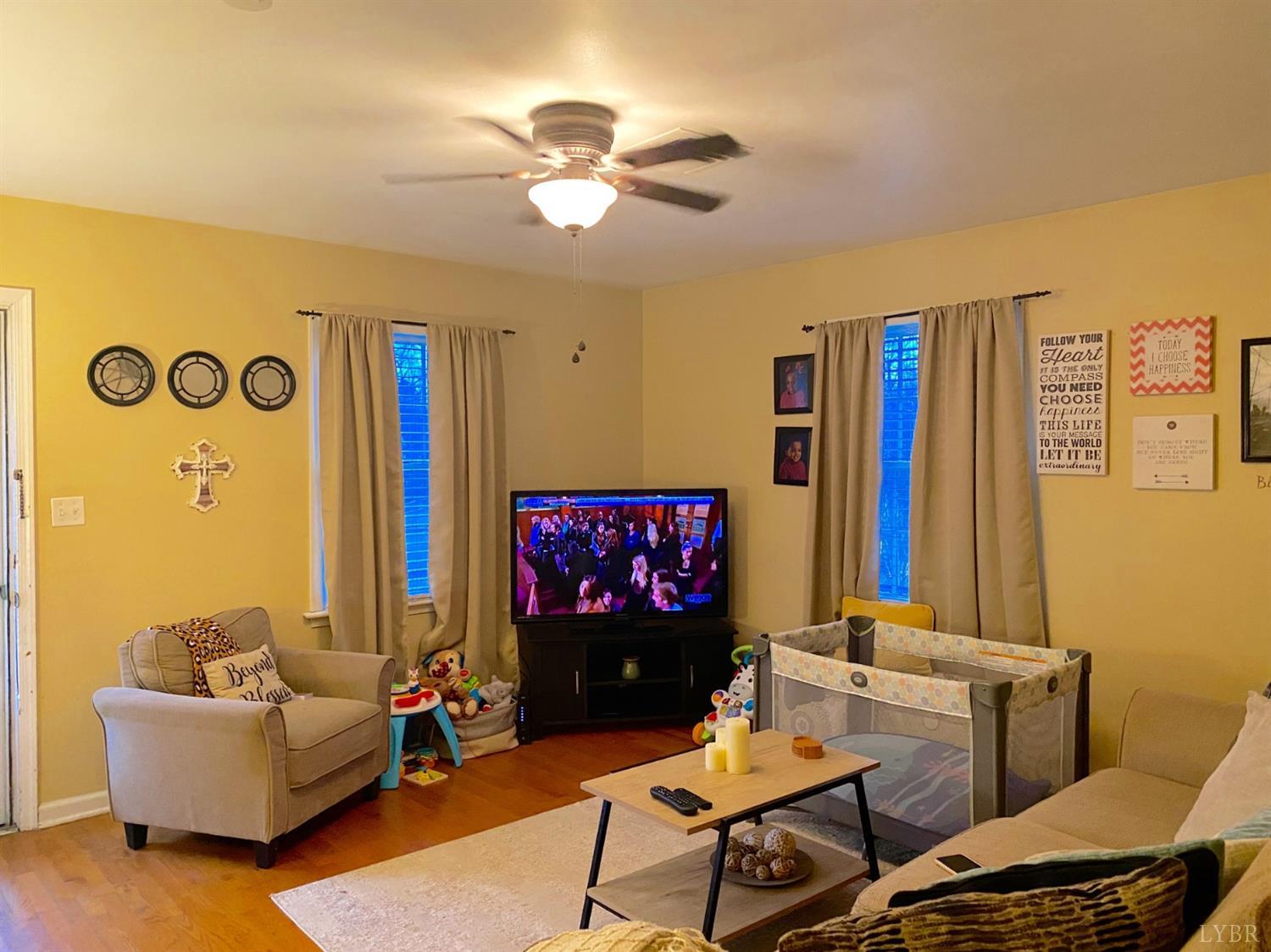 400 Riverside Drive Lynchburg, VA 24503 - Photo 22 of 40 a living room with furniture and a flat screen tv