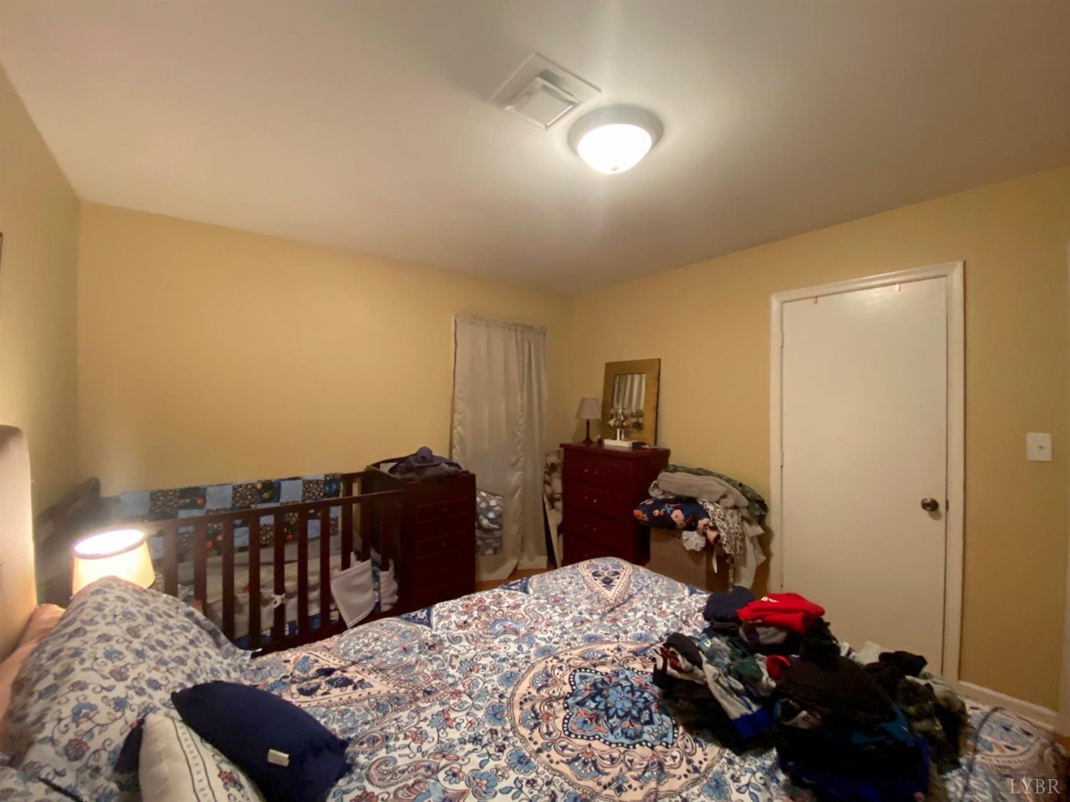 400 Riverside Drive Lynchburg, VA 24503 - Photo 35 of 40 a bedroom with a bed and a closet