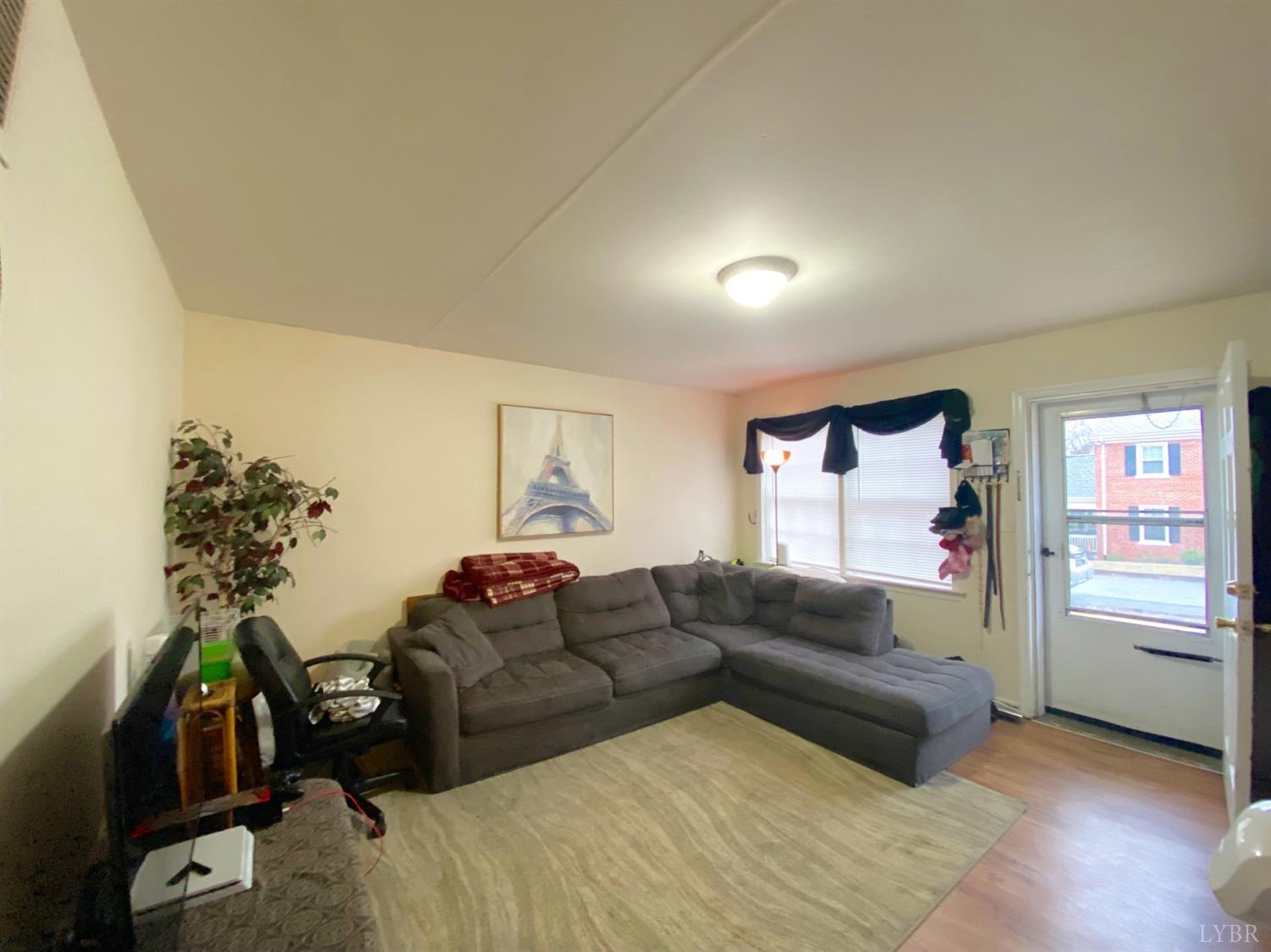 400 Riverside Drive Lynchburg, VA 24503 - Photo 4 of 40 a living room with furniture and a window