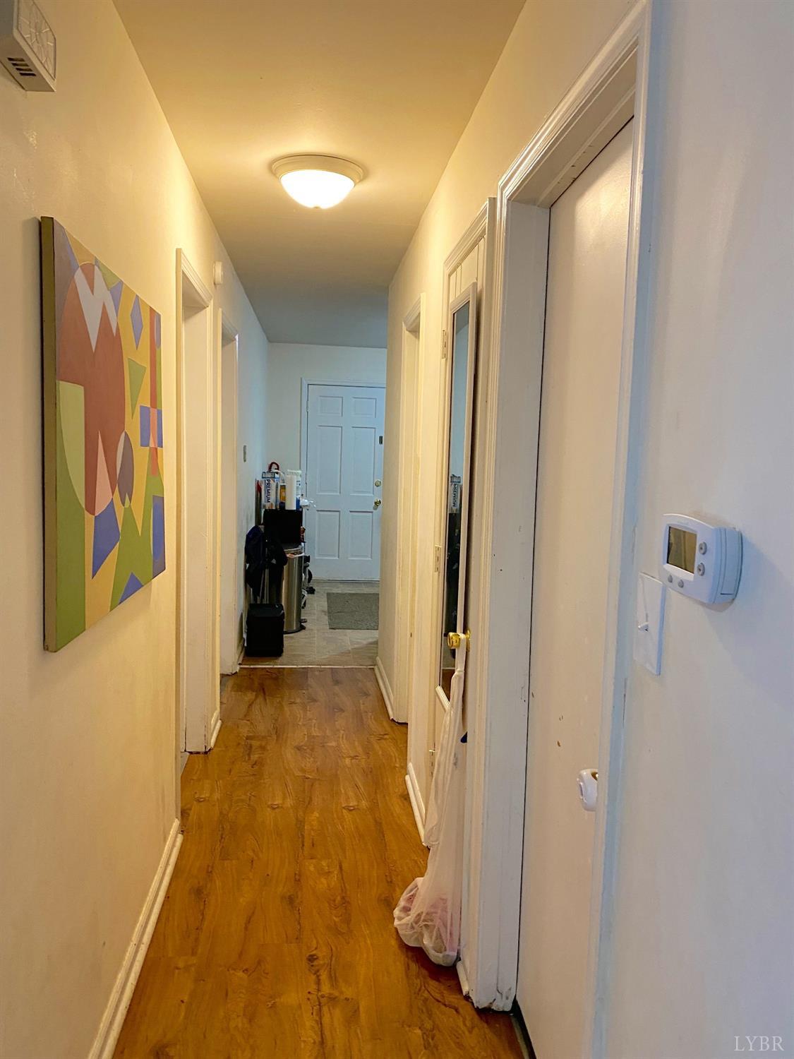 400 Riverside Drive Lynchburg, VA 24503 - Photo 7 of 40 a view of a hallway with furniture and a window