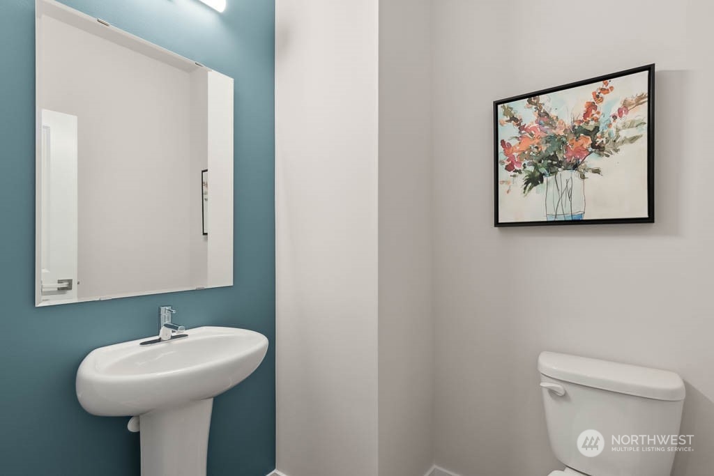 23413 Edmonds Way, Unit E2 Edmonds, WA 98026 - Photo 11 of 22 a bathroom with a sink and mirror