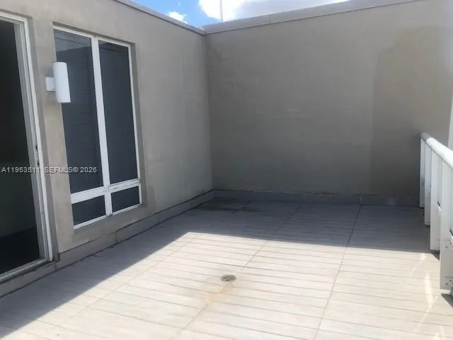 a kitchen with a stove and a refrigerator