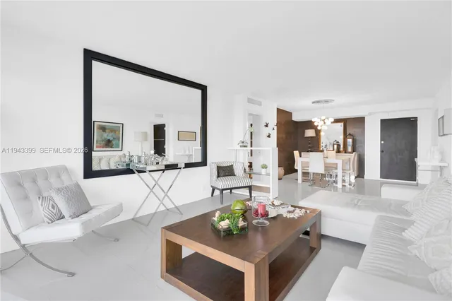 a kitchen with stainless steel appliances granite countertop a stove and a refrigerator