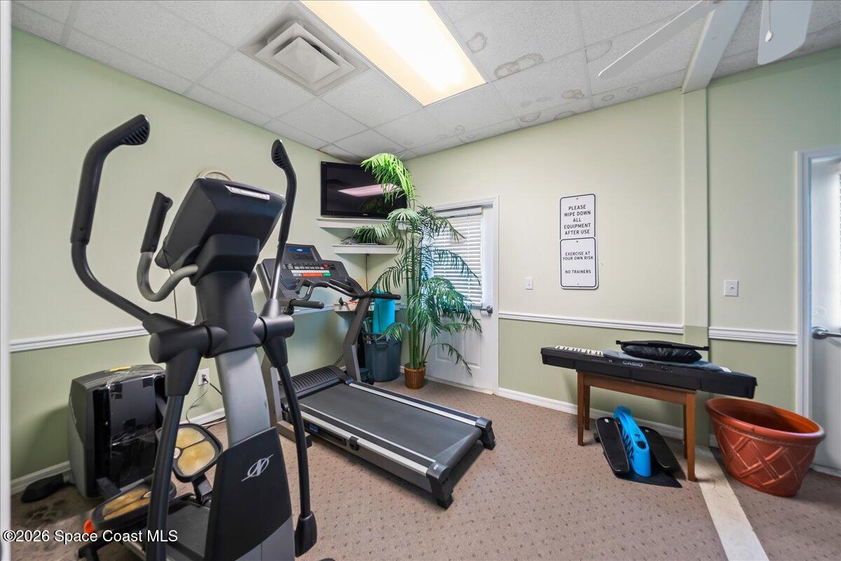 1813 Coco Plum Street Northeast Palm Bay, FL 32905 - Photo 43 of 44 a room with gym equipment