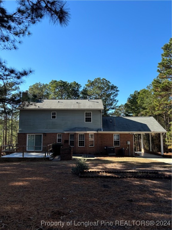 620 Myra Road Raeford, NC 28376 - Photo 38 of 38 a view of house with outdoor space and swimming pool