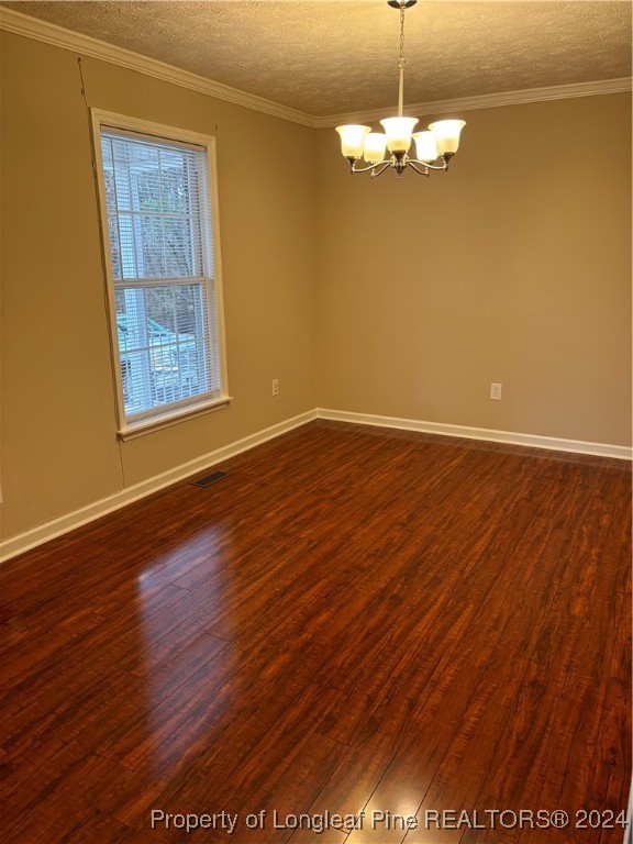 620 Myra Road Raeford, NC 28376 - Photo 6 of 38 a view of a room with wooden floor and a window