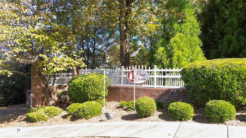 809 Abarca Lane Stockbridge, GA 30281 - Photo 8 of 11 a view of a chairs and table in the backyard