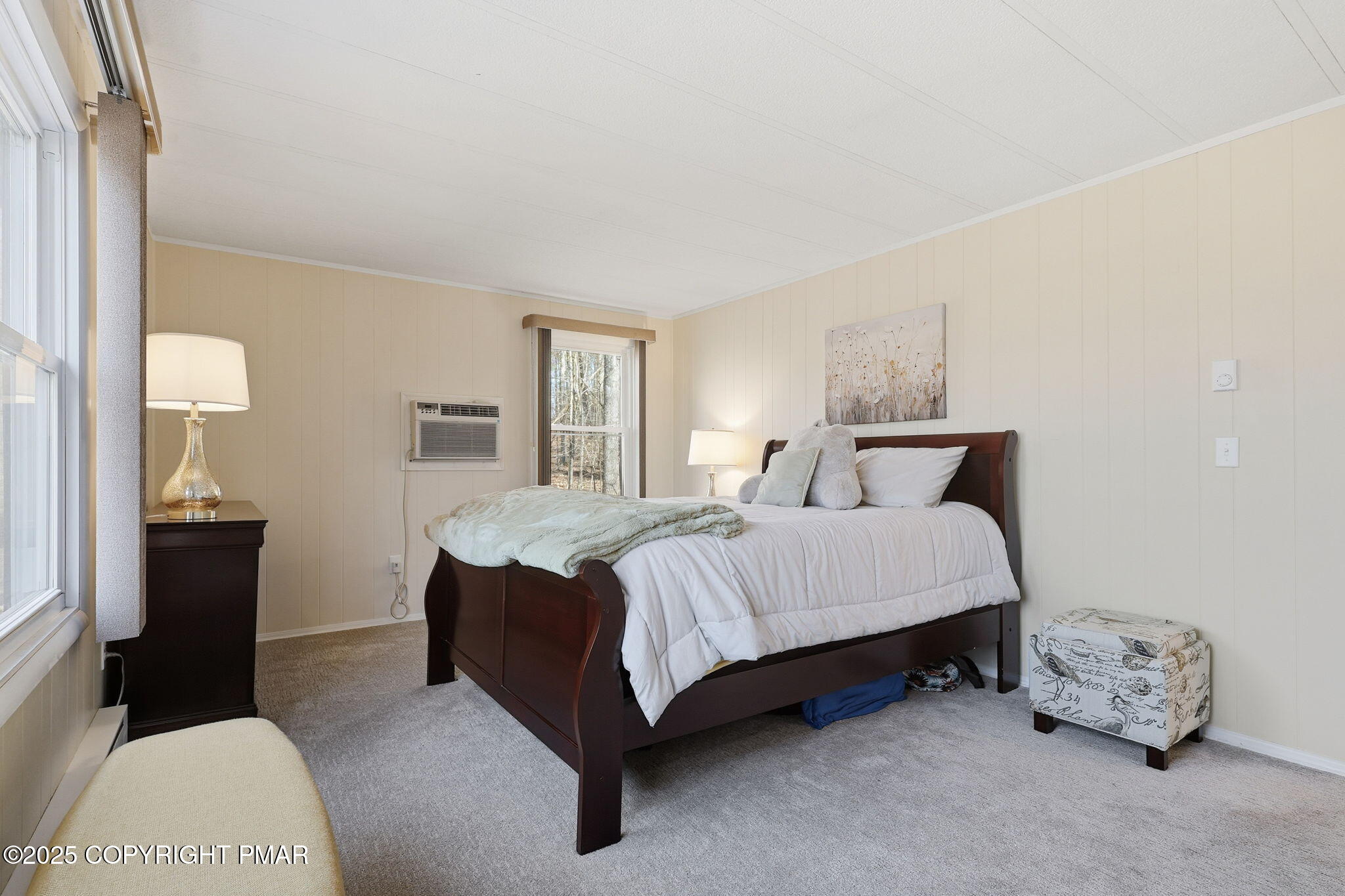 364 Welcome Lake Road Beach Lake, PA 18405 - Photo 12 of 46 a bedroom with a bed and a couch