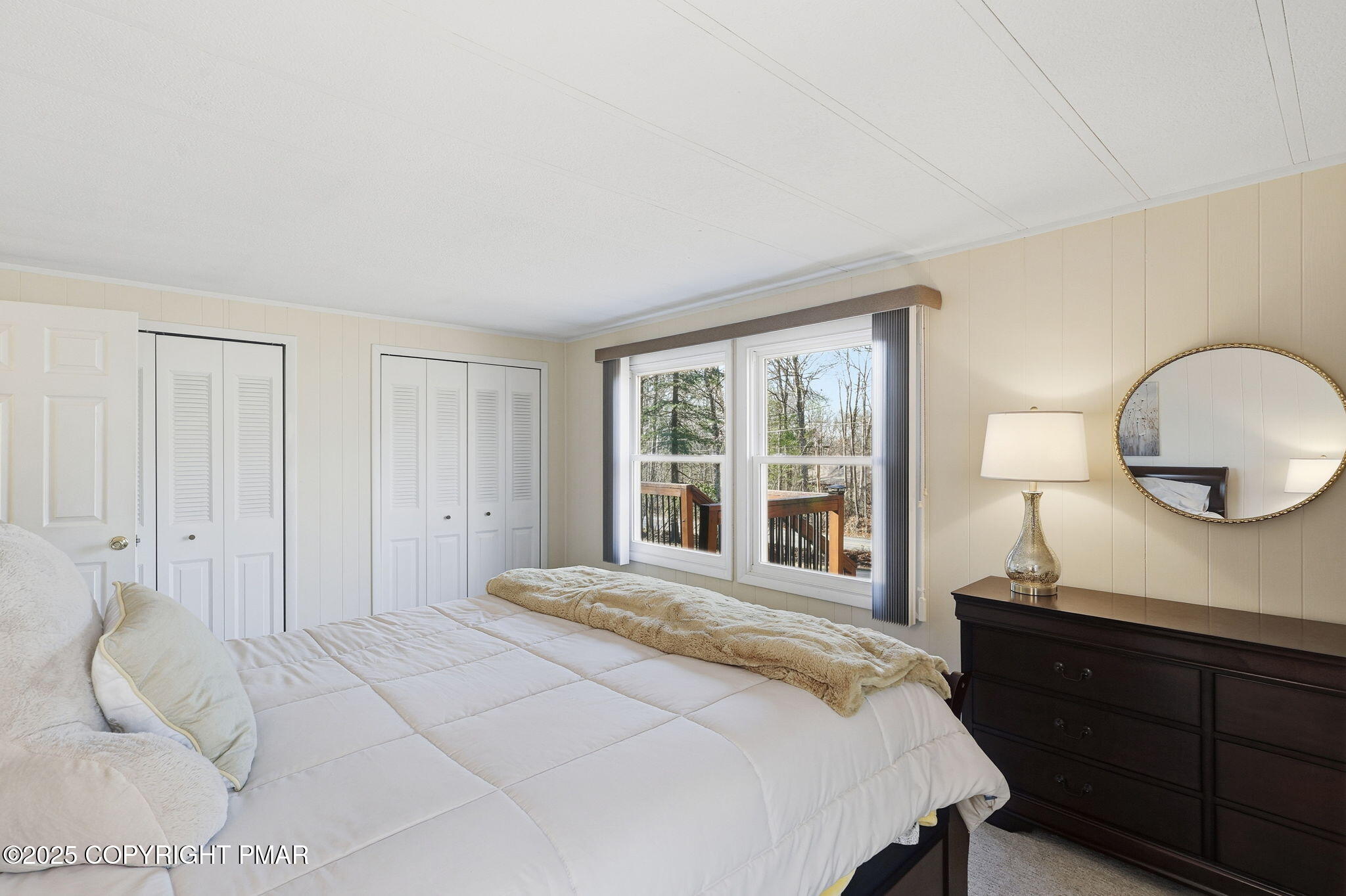 364 Welcome Lake Road Beach Lake, PA 18405 - Photo 13 of 46 a bedroom with a large bed and a window