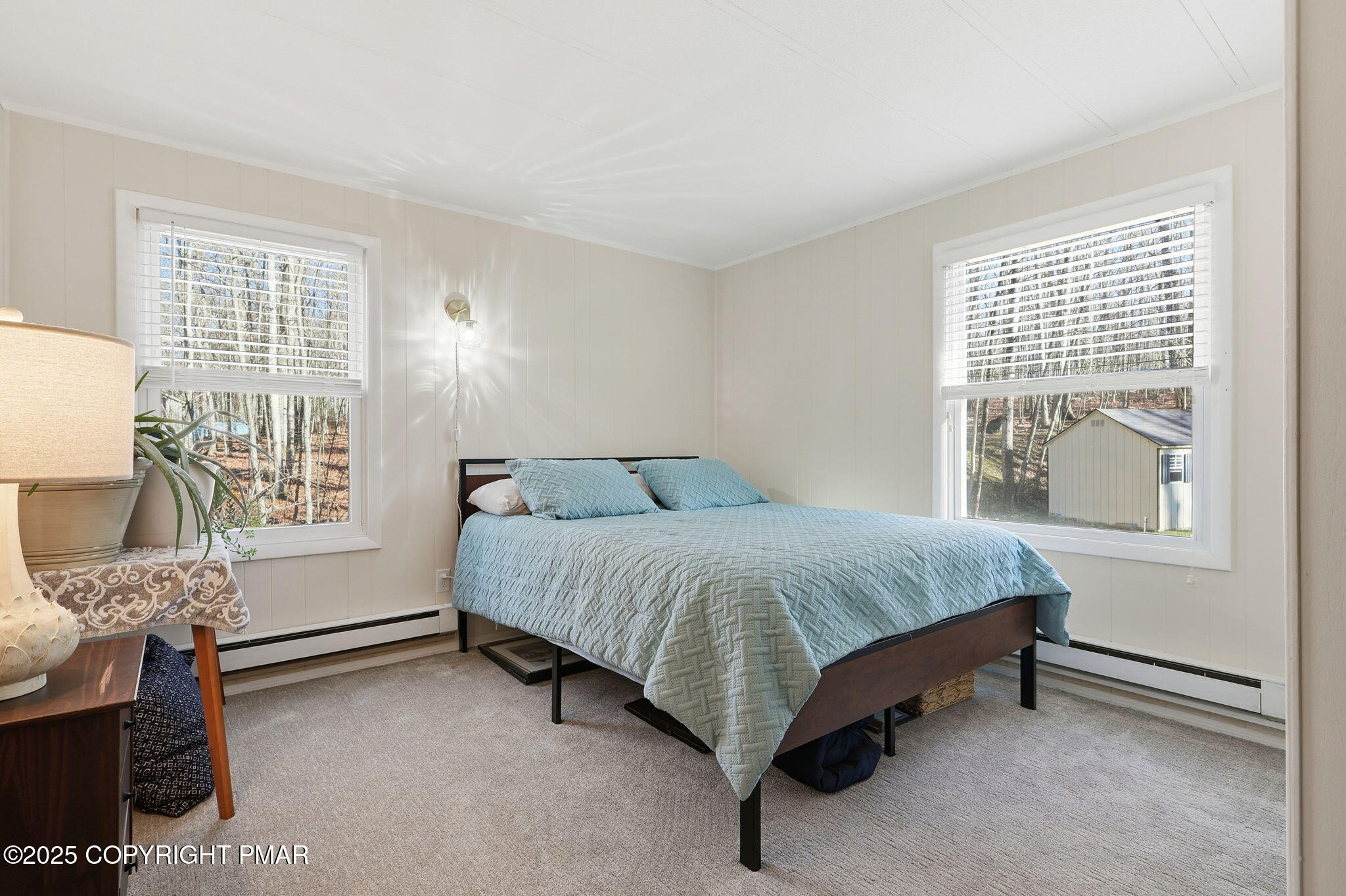 364 Welcome Lake Road Beach Lake, PA 18405 - Photo 16 of 46 a spacious bedroom with a bed and a window