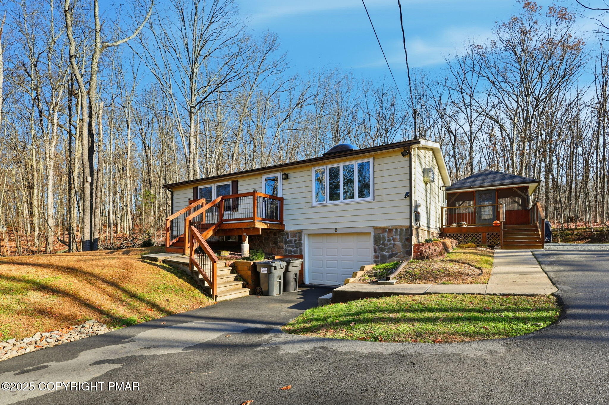 364 Welcome Lake Road Beach Lake, PA 18405 - Photo 2 of 46 a front view of a house with garden