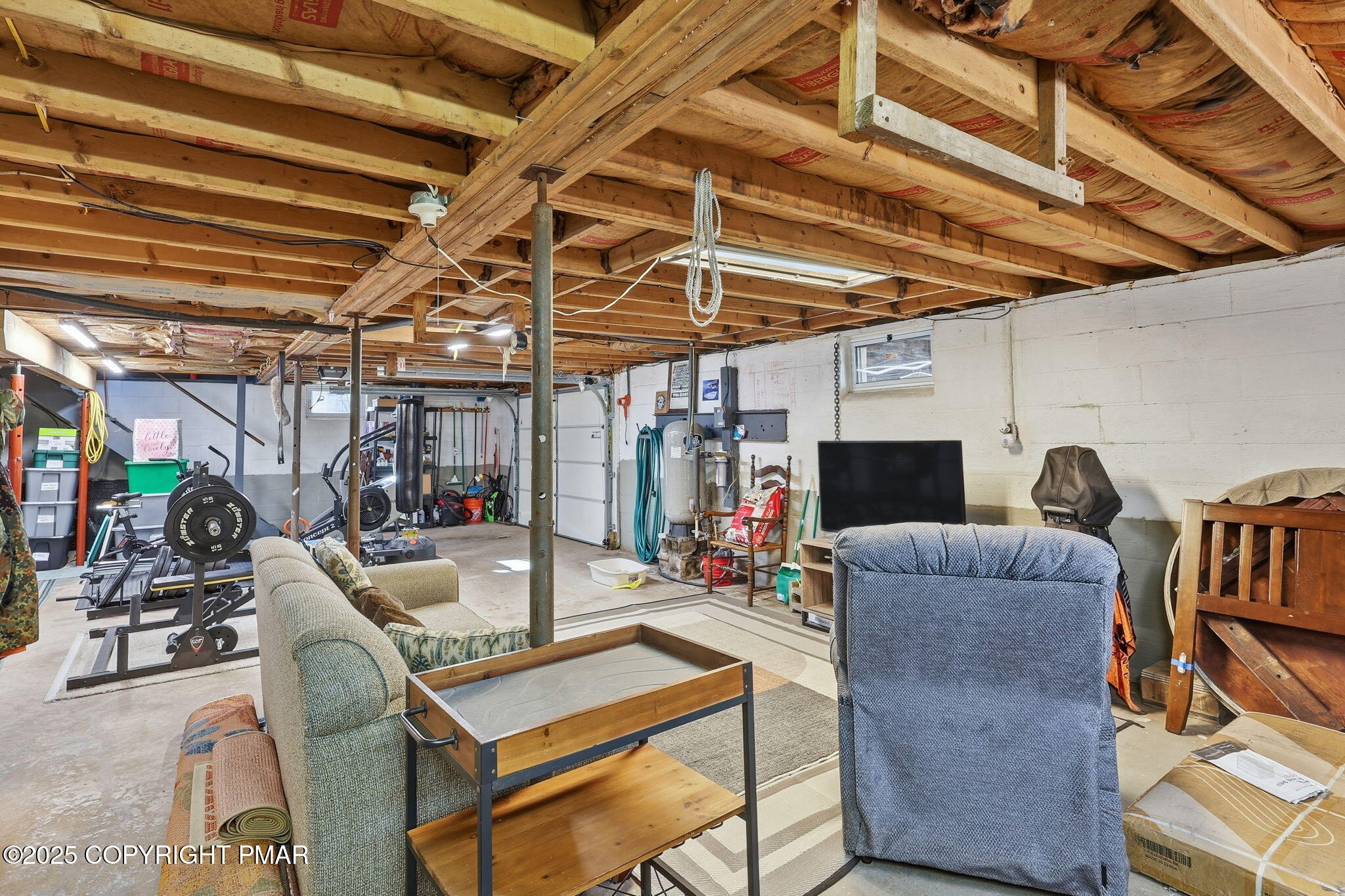 364 Welcome Lake Road Beach Lake, PA 18405 - Photo 27 of 46 a work room with furniture and a rug