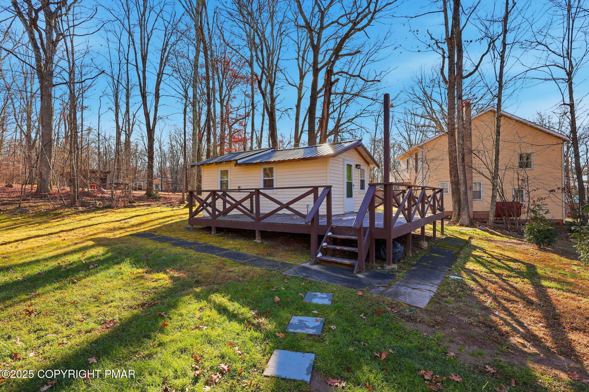 364 Welcome Lake Road Beach Lake, PA 18405 - Photo 33 of 46 a view of a swimming pool with a patio