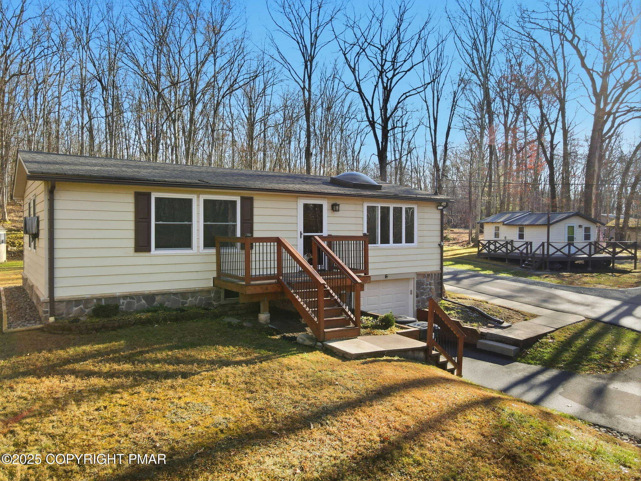 364 Welcome Lake Road Beach Lake, PA 18405 - Photo 36 of 46 a view of a house with backyard and sitting area