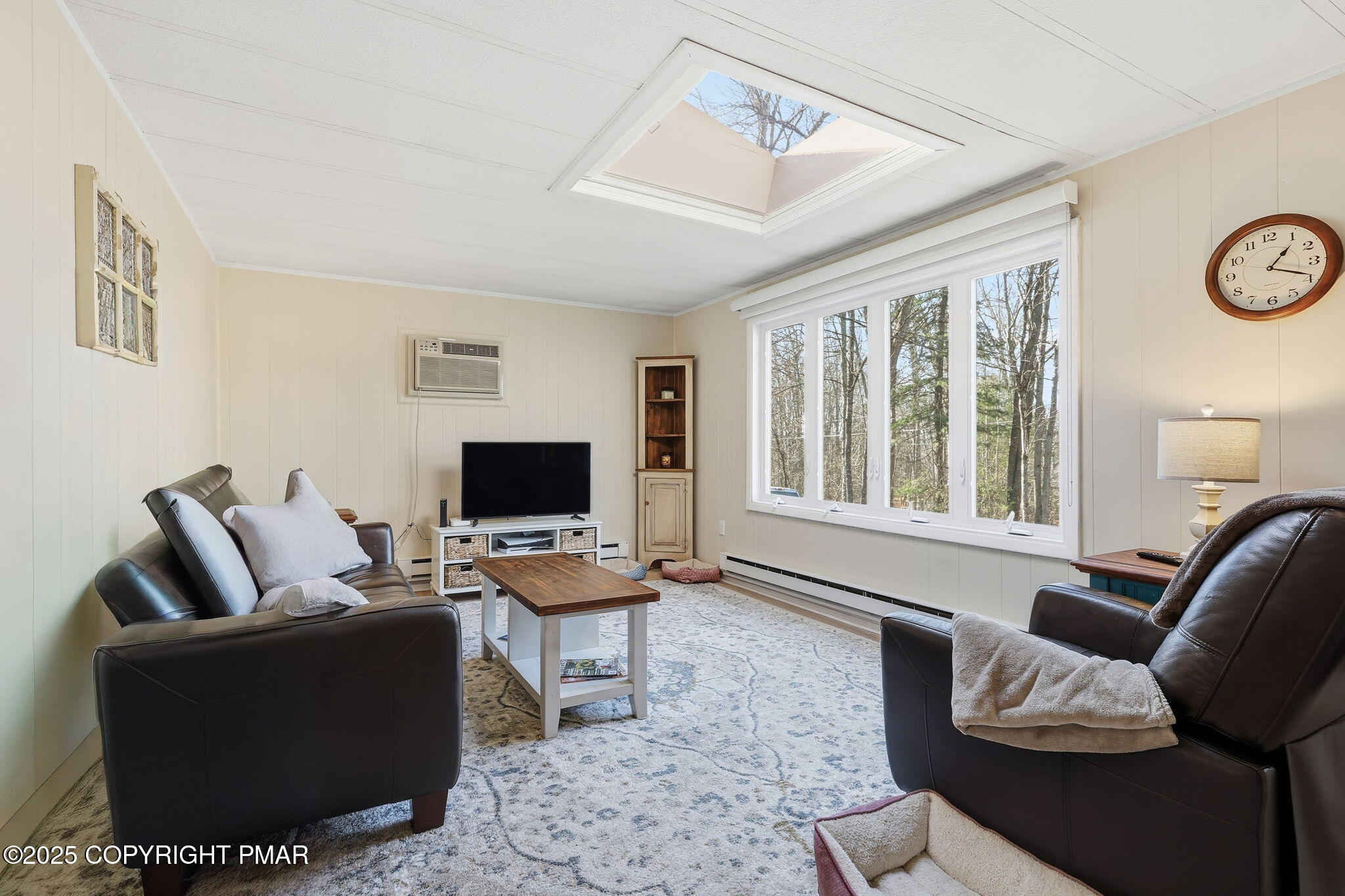 364 Welcome Lake Road Beach Lake, PA 18405 - Photo 45 of 46 a living room with furniture and a window