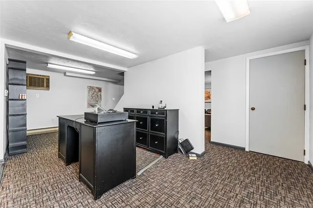 a kitchen with a stove and a refrigerator