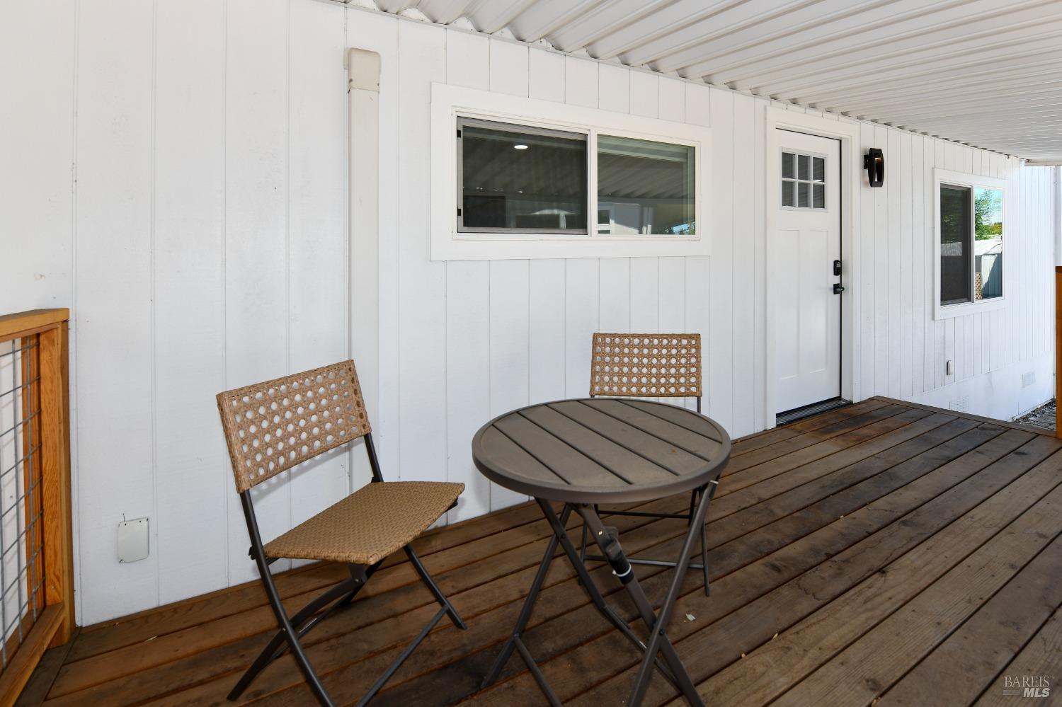 541 Mason Street, Unit 8 Healdsburg, CA 95448 - Photo 17 of 24 a view of chair and wooden floor