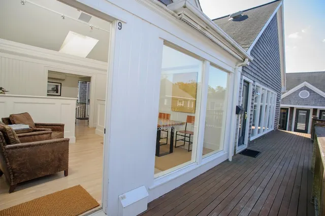 a view of a livingroom with wooden floor